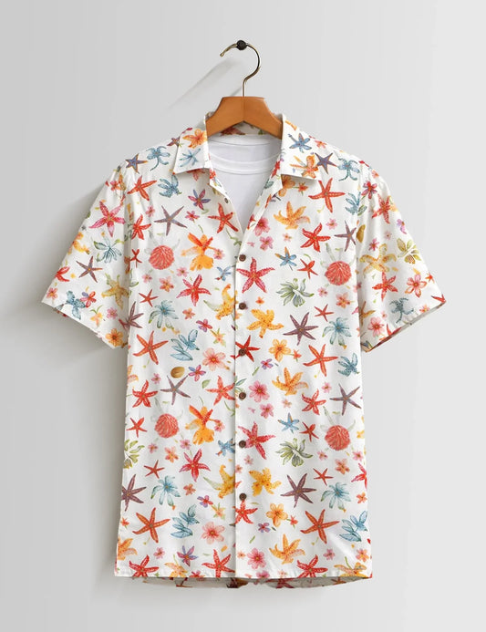 Colorful starfish pattern shirt on a hanger against a gray background