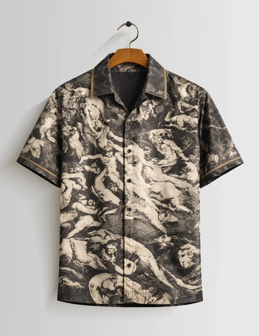 Short-sleeve shirt with a unique pattern on a hanger against a light gray background